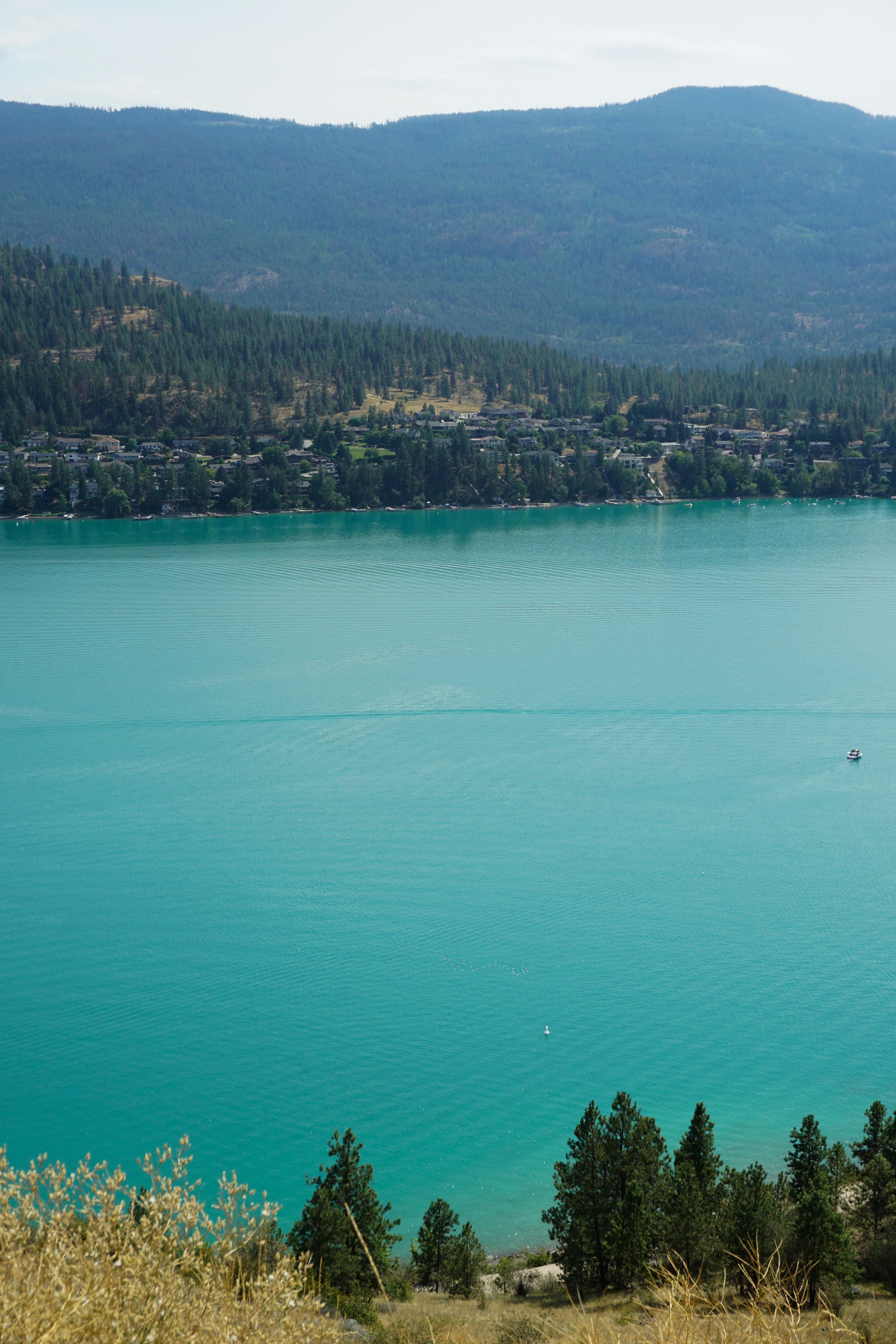 Clear turquoise waters and surrounding mountains